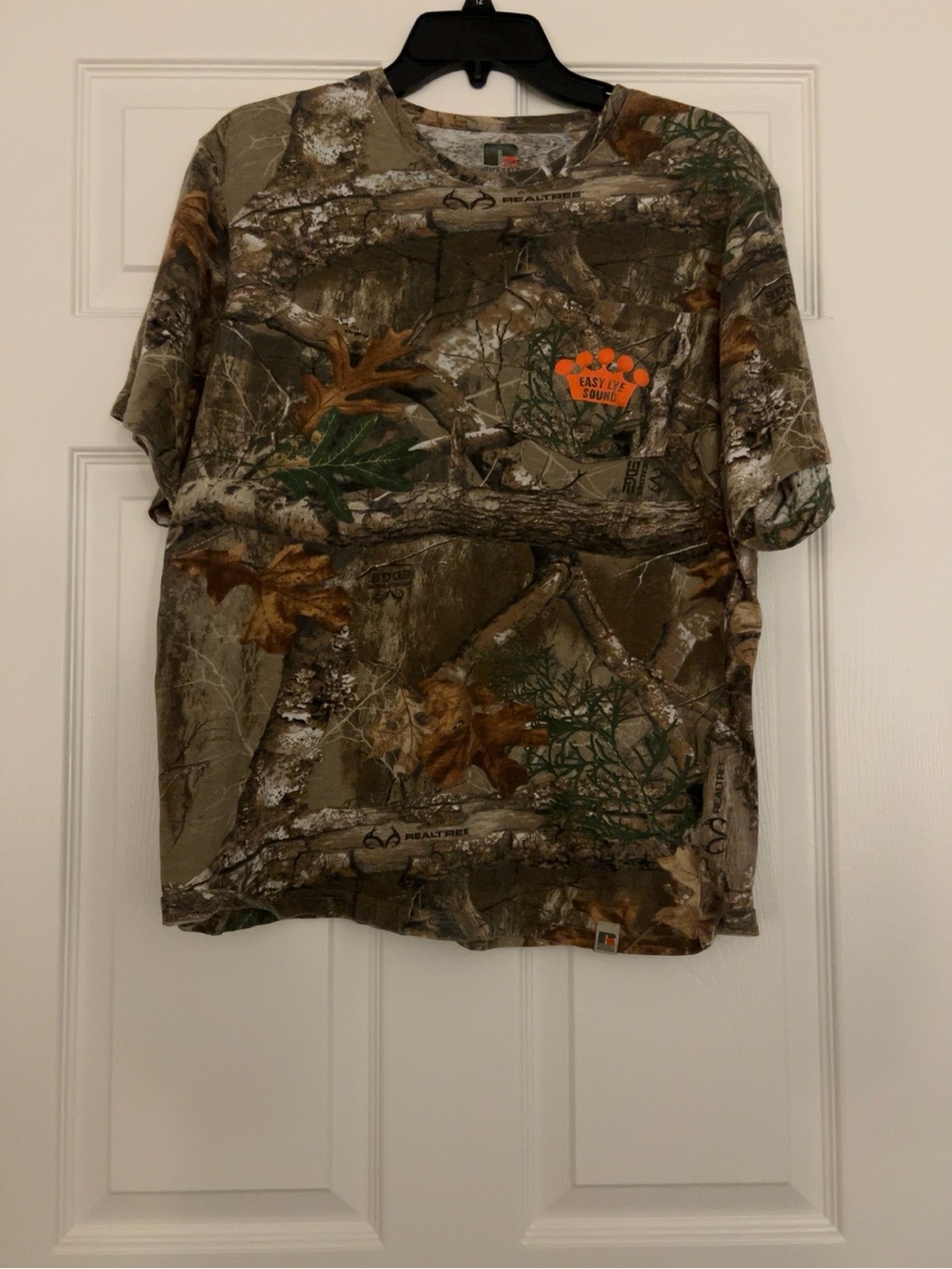 Russell Athletic Realtree Camo Short Sleeve Pocket Tee with Orange Paw Logo